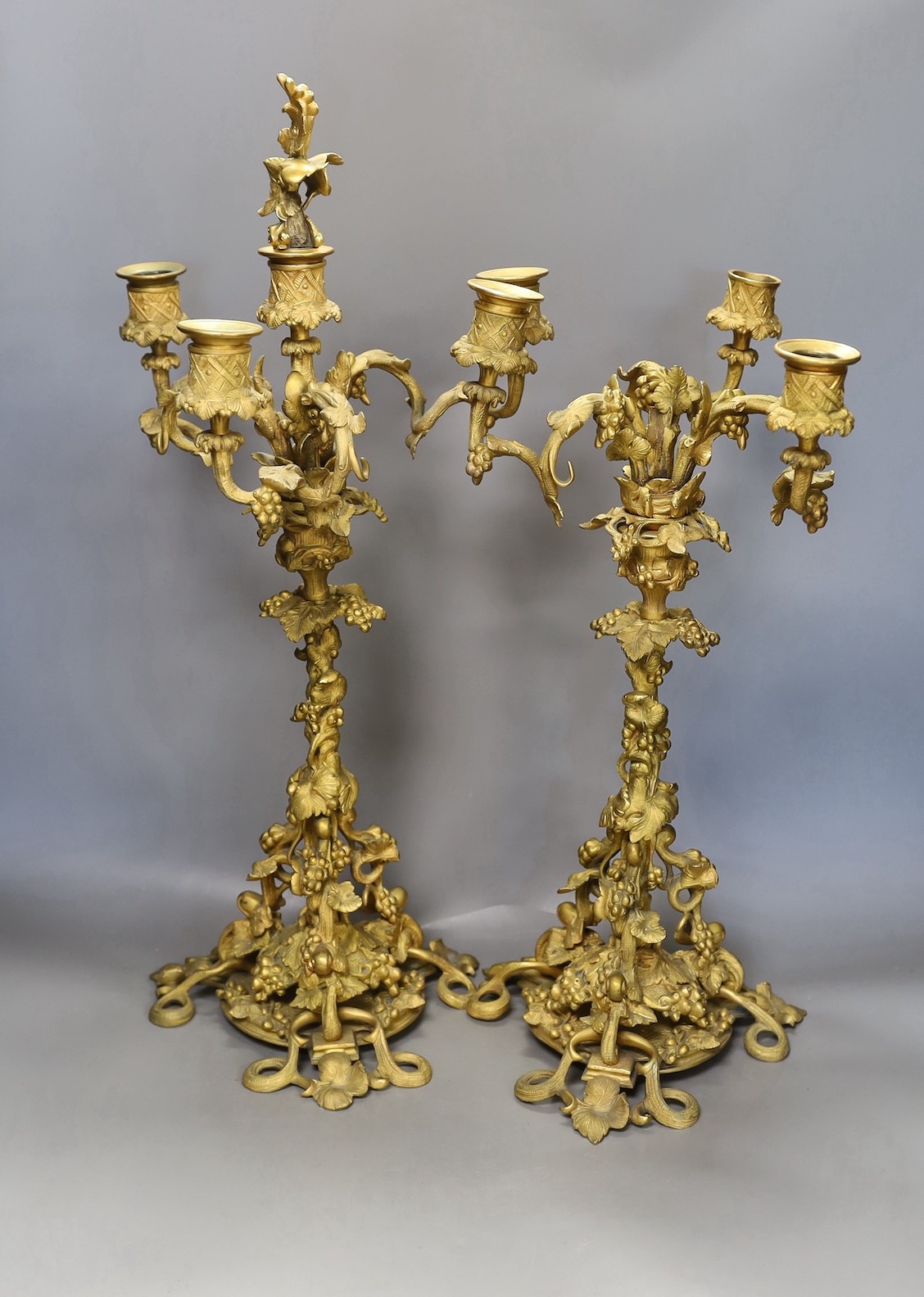 A pair of Victorian ormolu 4-light candelabra with vineous stems - 56cm tall